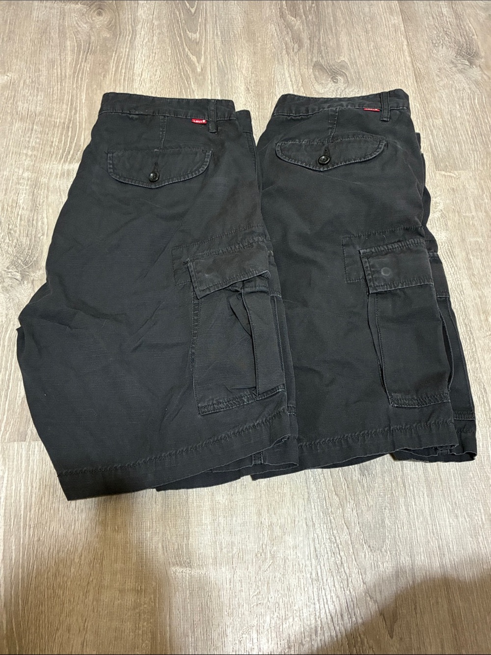 2 Levi’s Black Cargo Shorts with Button Flap Pockets